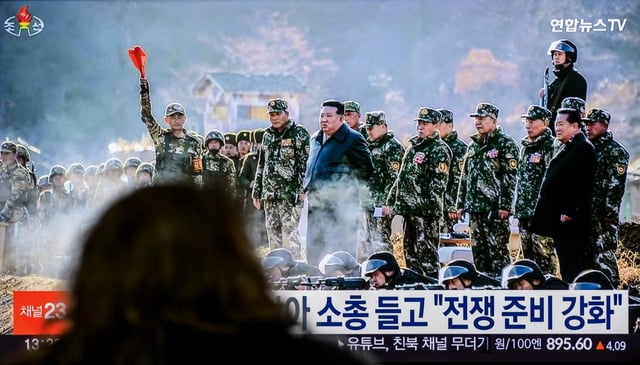 A TV shows North Korean leader Kim Jong Un visiting a military training base in North Korea's western region in Seoul, South Korea on March 7, 2024.