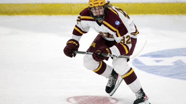FILE - Minnesota forward Logan Cooley skates during an NCAA college hockey game against Canisius, Thursday, March 23, 2023, in Fargo, N.D. The Arizona Coyotes signed 2022 first-round draft pick Logan Cooley on Thursday, July 27, 2023, to a three-year, entry-level contract, after the center changed his mind about returning to Minnesota for another college season. (AP Photo/Andy Clayton-King, File)