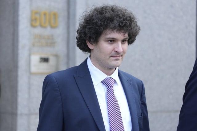 FTX founder Sam Bankman-Fried leaves Federal court, Wednesday, July 26, 2023, in New York. Prosecutors asked a New York judge on Friday, March 15, 2024 to sentence FTX founder Sam Bankman-Fried to between 40 and 50 years in prison for cryptocurrency crimes they described as a “historic fraud.”(AP Photo/Mary Altaffer)