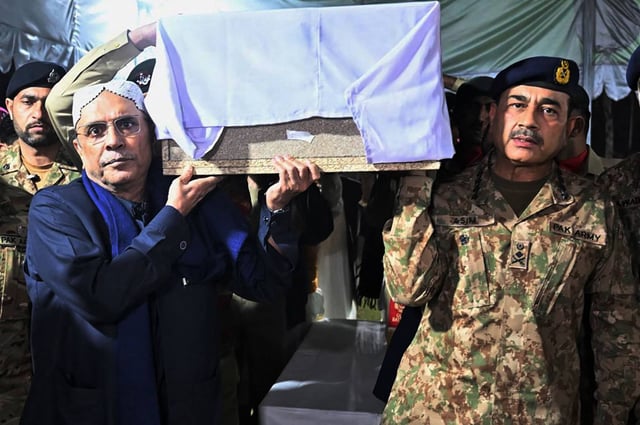 Pakistan’s Army Chief General Syed Asim Munir (right) and Pakistans President Asif Ali Zardari carry the coffin of captain Muhammad Ahmed Badar, who was killed along with other soldiers in a militant attack in North Waziristan district, during the funeral ceremony in Rawalpindi. Photo: Handout/AFP