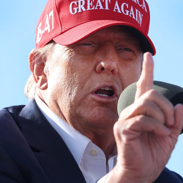 Republican presidential candidate former President Donald Trump speaks to supporters during a rally at the Dayton International Airport on March 16, 2024 in Vandalia, Ohio. A Poll finfs hat 48 percent of Republcjans do not believe former president's can cite absolute immunity for alleged crimes committed in office.
