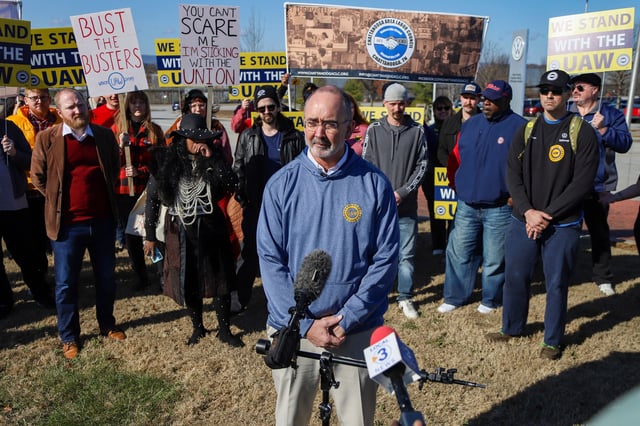 UAW President Shawn Fain speaks to the media in Chattanooga, Tenn., on Monday, Dec. 18, 2023. Fain visited the Volkswagen plant with workers, community and faith leaders, and CALEB (Chattanoogans in Action for Love, Equality, and Benevolence). The group delivered a letter to Volkswagen management, "demanding the company end its union-busting and intimidation."