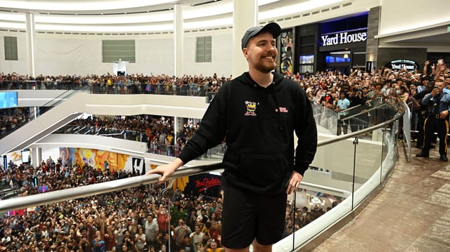 Global YouTube star MrBeast poses with fans at the launch of the first physical MrBeast Burger Restaurant at American Dream on September 4, 2022 in East Rutherford, New Jersey.
