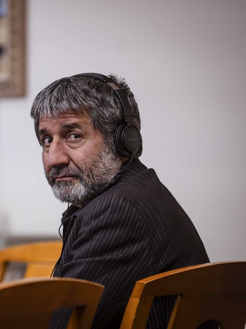Muhammad Syed looks over his shoulder during closing arguments at the Bernalillo County Courthouse in Downtown Albuquerque, N.M,, on Friday, March 15, 2024. Prosecutors on Friday wrapped up their case against Syed on charges that he gunned down a man in 2022 in what turned out to be the first of three ambush-style killings involving members of the Muslim community in New Mexico's largest city. (Chancey Bush)/The Albuquerque Journal via AP, Pool)