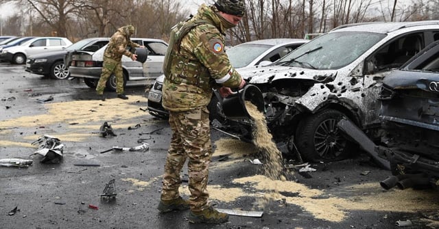 Military personnel are seen in the aftermath of what local authorities called a Ukrainian missile attack, in the course of the Russia-Ukraine conflict in Belgorod, Russia, March 17, 2024. Governor of Belgorod Region/Vyacheslav Gladkov via Telegram/Handout via REUTERS