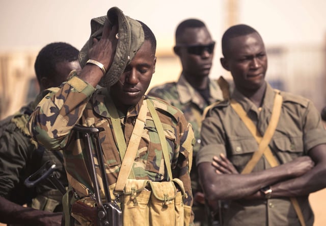 A Nigerian soldier wipes sweat off his face while participating in a special forces training exercise during Exercise Flintlock 2018 in Agadez, Niger, April 14, 2018.