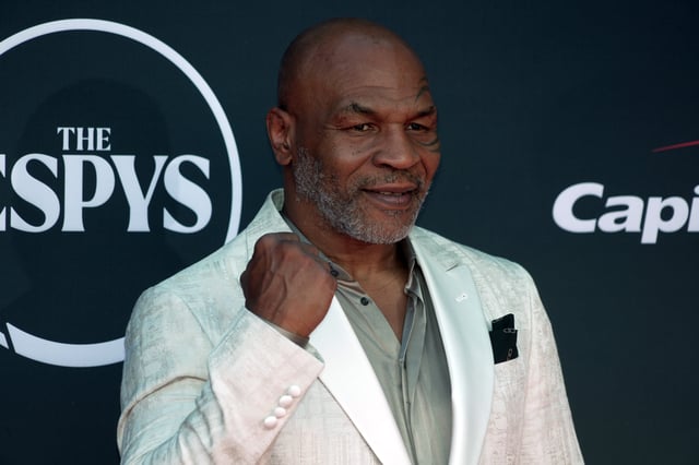 Mike Tyson arrives on the red carpet before the 2023 ESPYS at the Dolby Theatre.