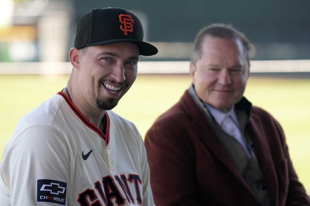 New San Francisco Giants pitcher Blake Snell is all smiles as he is introduced during a  news conference as agent Scott Boras listens in Wednesday.