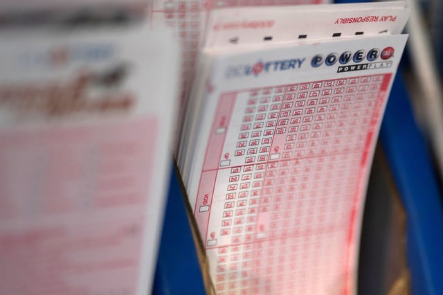 Powerball tickets are seen at a liquor store in Washington on July 19, 2023.