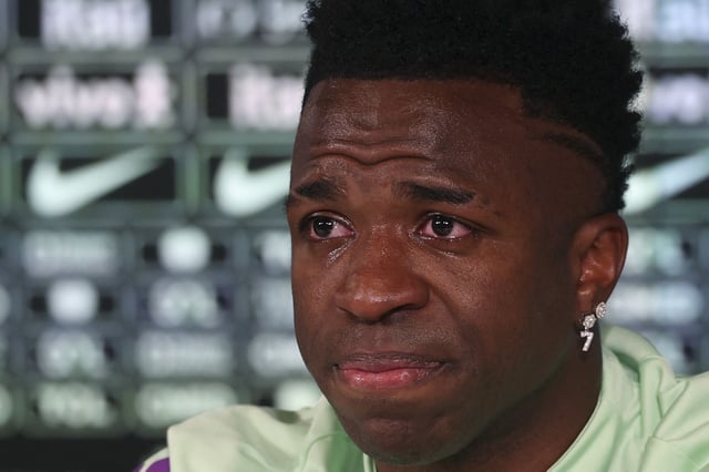 Brazil's forward Vinicius Junior cries as he gives a press conference on the eve of the international friendly football match between Spain and Brazil at the Ciudad Real Madrid training ground in Valdebebas, outskirts of Madrid, on March 25, 2024. Spain arranged a friendly against Brazil at the Santiago Bernabeu under the slogan "One Skin" to help combat racism. (Photo by Pierre-Philippe MARCOU / AFP) (Photo by PIERRE-PHILIPPE MARCOU/AFP via Getty Images)