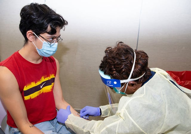 Oscar Flores gets his first dose of mpox vaccine Thursday, Sept. 15, 2022, at The Health Museum in Houston.