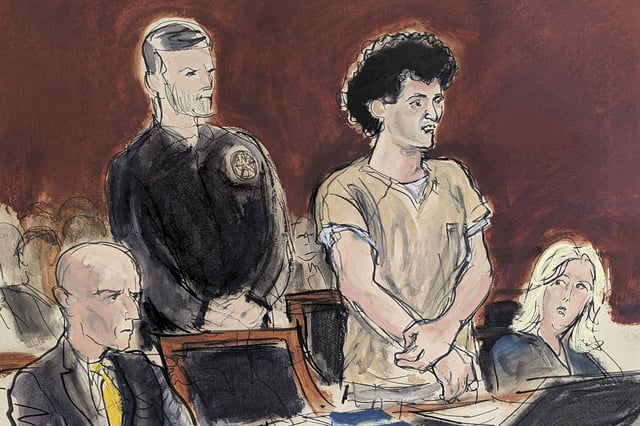 In this courtroom sketch, Sam Bankman-Fried, second from right, stands while making a statement during his sentencing in Manhattan federal court, Thursday, March. 28, 2024, in New York. Crypto entrepreneur Bankman-Fried was sentenced Thursday to 25 years in prison for a massive fraud that unraveled with the collapse of FTX, once one of the world's most popular platforms for exchanging digital currency.
