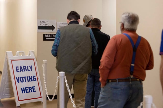 People wait in line to vote early in Lexington, South Carolina, on February 22, 2024.