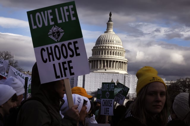 WASHINGTON, DC - JANUARY 20: People attend the 50th annual March for Life rally on the National Mall on January 20, 2023 in Washington, DC. Anti-abortion activists attended the annual march to mark the first to occur in a “post-Roe nation” since the Supreme Court's Dobbs vs Jackson Women's Health ruling which overturned 50 years of federal protections for abortion healthcare. (Photo by Anna Moneymaker/Getty Images)