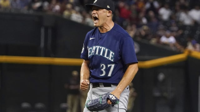 Seattle Mariners pitcher Paul Sewald celebrates striking out Arizona Diamondbacks' Christian Walker for the final out of a baseball game Friday, July 28, 2023, in Phoenix. The Mariners won 5-2. (AP Photo/Darryl Webb)