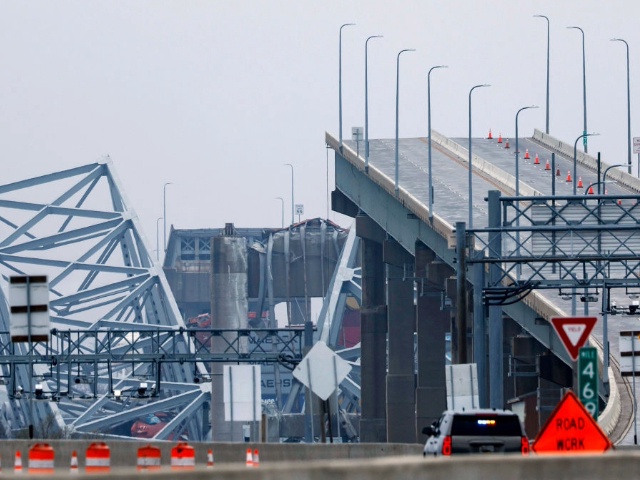BALTIMORE, MARYLAND - MARCH 27: The collapsed Francis Scott Key Bridge is seen in the background of the on-ramp to the bridge on March 27, 2024 in Baltimore, Maryland. Two survivors were pulled from the Patapsco River and six missing people are presumed dead after the Coast Guard called off rescue efforts. A work crew was fixing potholes on the bridge, which is used by roughly 30,000 people each day, when the ship struck at around 1:30am on Tuesday morning. The accident has temporarily closed the Port of Baltimore, one of the largest and busiest on the East Coast of the U.S. (Photo by Anna Moneymaker/Getty Images)