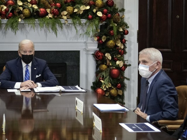 WASHINGTON, DC - DECEMBER 16: U.S. President Joe Biden speaks during a meeting with the White House COVID-19 Response Team, including National Institute of Allergy and Infectious Diseases Director Anthony Fauci (R) (Drew Angerer/Getty Images)