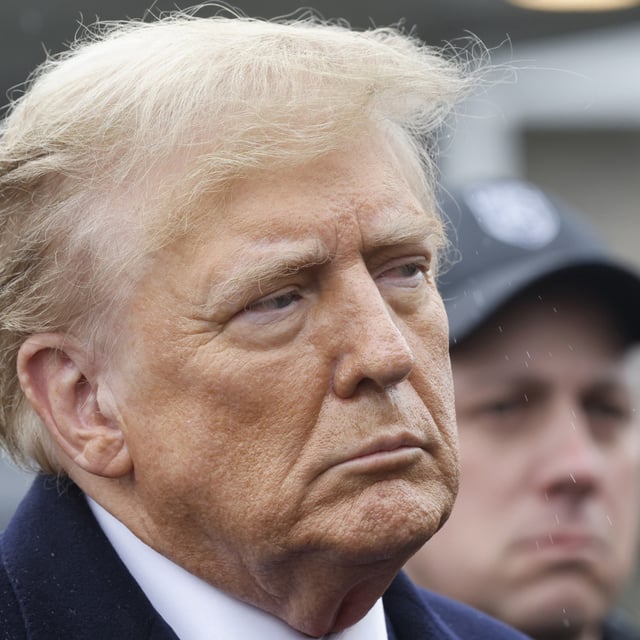 Former President Donald Trump stands silently after giving a brief statement after attending the wake for slain NYPD Officer Jonathan Diller at the Massapequa Funeral Home on March 28, 2024 in Massapequa, New York. A former Trump official said he won't vote for his former boss, joining a list of others from Trump's White House.