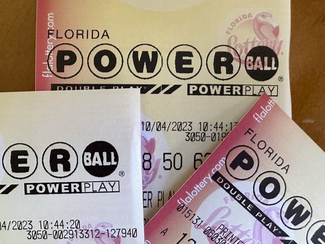 Powerball lottery tickets are displayed Oct. 4, 2023, in Surfside, Fla. (AP Photo/Wilfredo Lee, File)