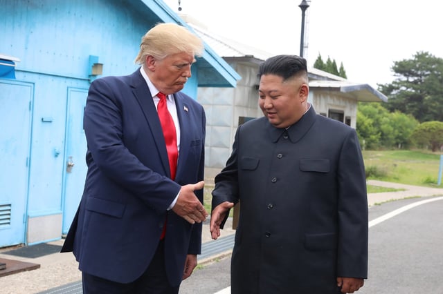 Then-US President Donald Trump goes to shake hands with Kim Jong-un inside the demilitarised zone separating South and North Korea on June 30, 2019. Photo: Dong-A Ilbo/Getty Images/TNS