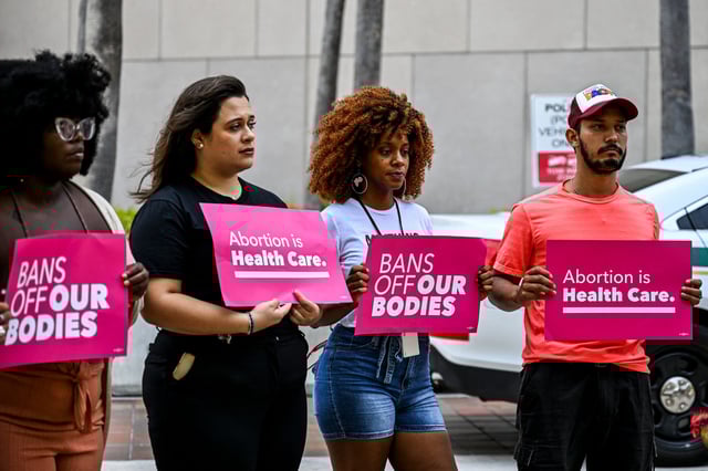 Members of Florida Planned Parenthood PAC Abortion rights activists protest in Miami the ruling that overturned Roe v. Wade in 2022. 