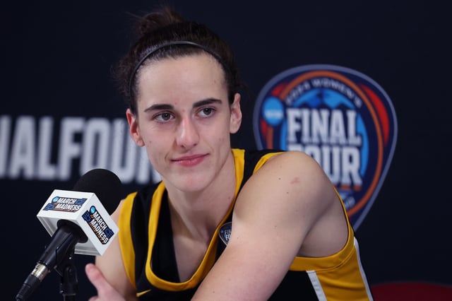 Caitlin Clark talks with the media after Iowa's loss to South Carolina in the 2024 NCAA Women's Basketball Tournament National Championship on April 7.