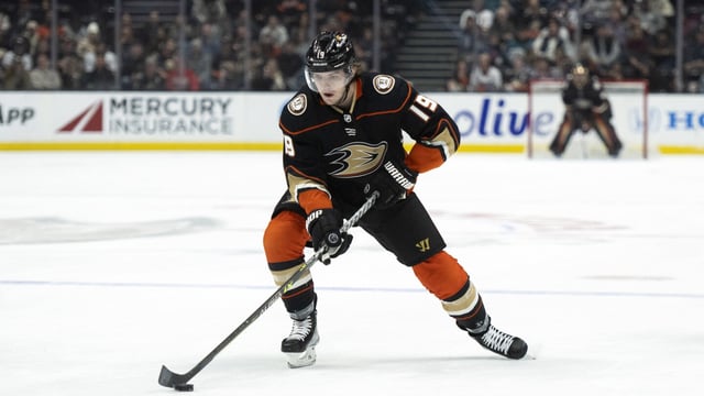FILE - Anaheim Ducks right wing Troy Terry (19) controls the puck during the first period of an NHL hockey game against the San Jose Sharks in Anaheim, Calif., Friday, Jan. 6, 2023. All-Star forward Troy Terry agreed to a seven-year, $49 million contract extension with the Anaheim Ducks on Wednesday, Aug. 2, 2023. (AP Photo/Kyusung Gong, File)