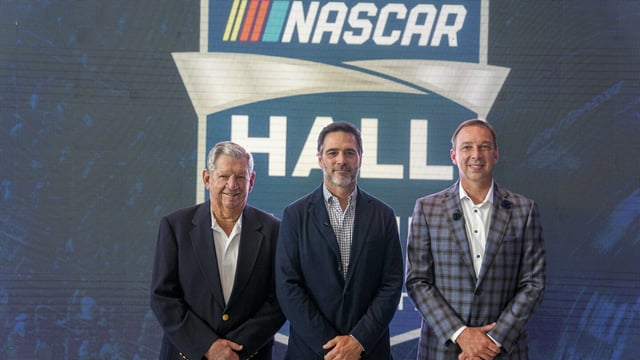 Donny Allison, left, Jimmie Johnson, center, and Chad Knaus pose for a picture after being selected into the NASCAR Hall of Fame on Wednesday, Aug. 2, 2023, in Charlotte, N.C. (AP Photo/Chris Carlson)