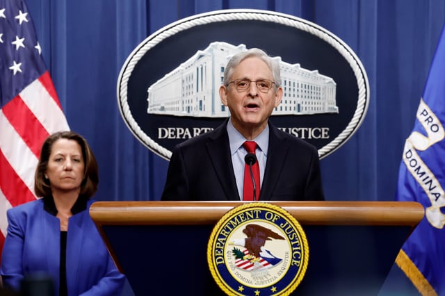 WASHINGTON, DC - MARCH 21: U.S. Attorney General Merrick Garland speaks alongside Deputy Attorney General Lisa Monaco during a news conference at the Department of Justice Building on March 21, 2024 in Washington, DC. During the news conference Garland and DOJ officials announced the department would be taking action against Apple, claiming that the tech company has an illegal monopoly on smartphones, violating antitrust laws. (Photo by Anna Moneymaker/Getty Images)