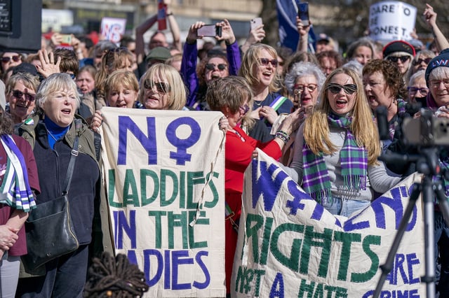 People take part in the Let Women Speak rally outside The Royal Scottish Academy in Edinburgh on Saturday.