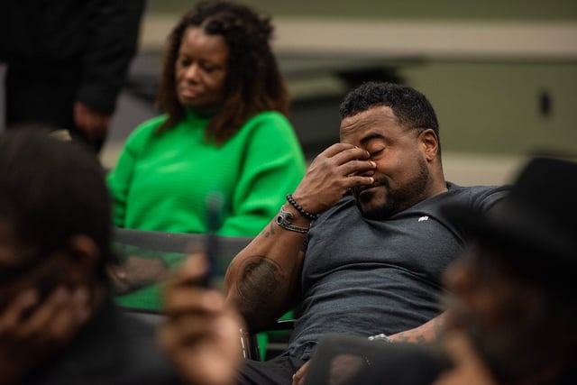 Bertron Beard, army lieutenant, holds his face in his hands as he listens to crimes the Goon Squad committed during a town hall meeting about police brutality in Rankin County hosted by the Rankin County NAACP at the Brandon Public Library in Brandon, Miss., on Tuesday, Mar. 19, 2024. Beard was stationed here last year, and 'Goon Squad' was the first thing that popped up when they researched the area. "It's worse than we thought," Beard said.