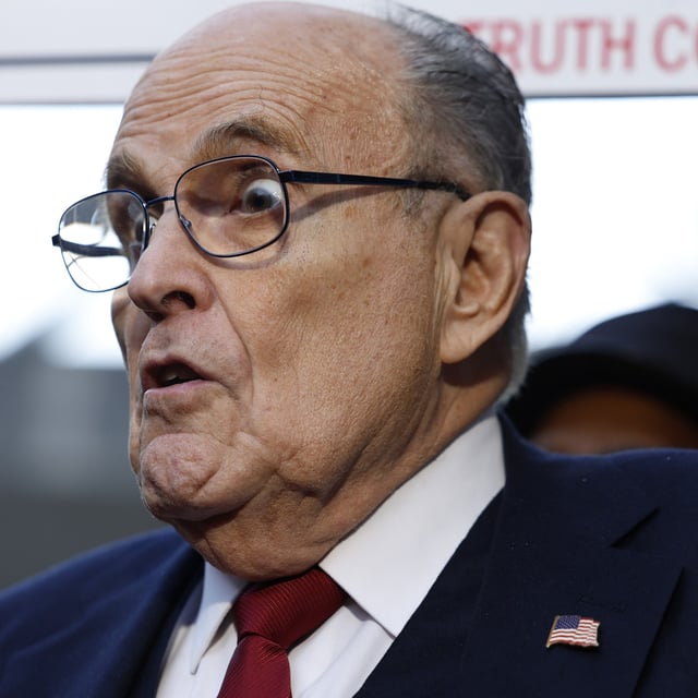 Rudy Giuliani speaks with reporters on December 15, 2023 in Washington D.C. after a jury ordered Giuliani to pay $148 million in damages to Fulton County election workers Ruby Freeman and Shaye Moss. Trump is facing a separate criminal case in Georgia for alleged election fraud.