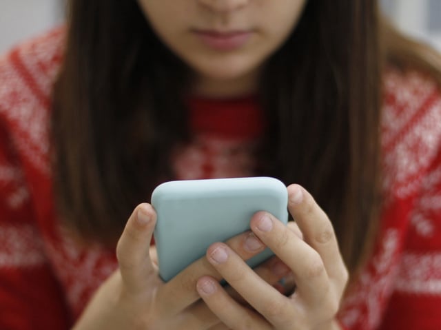 Young Woman Using Smart Phone