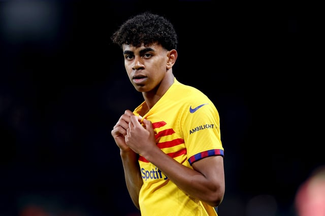 Lamine Yamal of FC Barcelona looks on during the UEFA Champions League quarter-final first leg match between Paris Saint-Germain and FC Barcelona at Parc des Princes on April 10, 2024 in Paris, France.