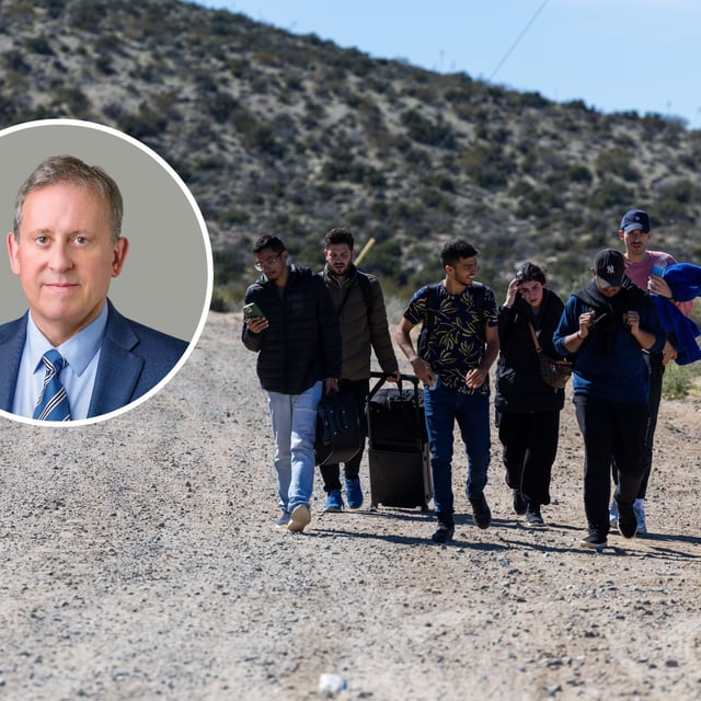 Migrants arrive at a makeshift camp after crossing the nearby border with Mexico near the Jacumba Hot Springs on February 22, 2024 in San Diego, California. Judge Thomas Fink walked out of the trial of rancher George Alan Kelly, who is accused of shooting a migrant on his ranch, after the judge complained it was taking too long.