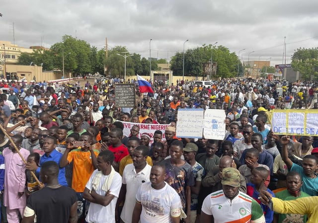 FILE - Supporters of Niger's ruling junta, gather for a protest called to fight for the country's freedom and push back against foreign interference, in Niamey, Niger, Aug. 3, 2023. A top Pentagon official says that the U.S. has not received a formal request from Niger's junta to depart the country, saying instead it has received mixed signals on whether the hundreds of U.S. troops based there are no longer welcome.