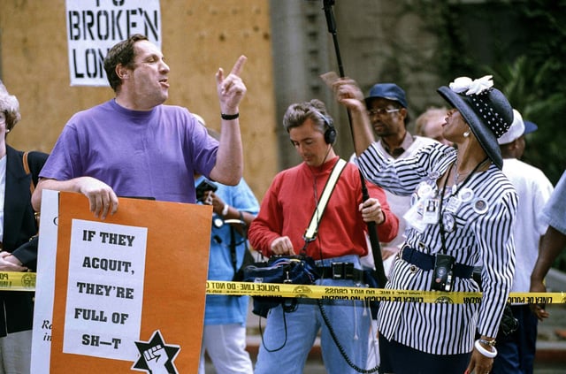 Irv Rubin, left, of the Jewish Defense League, argues about the O.J. Simpson case with Shirley Ann Stanley, a Simpson supporter, outside of the Criminal Courts Building in Los Angeles on Sept. 29, 1995.