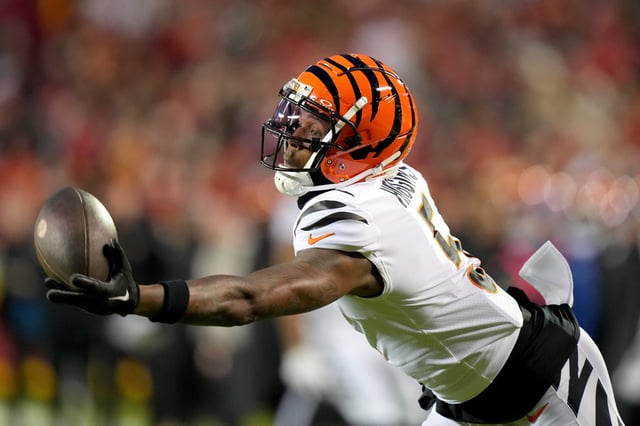 Cincinnati Bengals wide receiver Tee Higgins (5) gets his hand on a deep pass in the third quarter during a Week 17 NFL football game between the Cincinnati Bengals and the Kansas City Chiefs, Sunday, Dec. 31, 2023, at GEHA Field at Arrowhead Stadium in Kansas City, Mo. The Kansas City Chiefs won, 25-17.