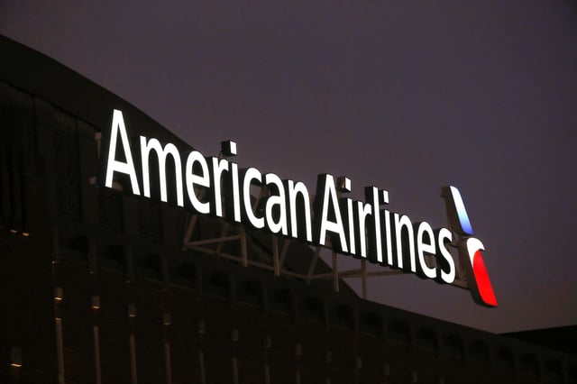 The American Airlines logo is stands atop the American Airlines Center, Dec. 19, 2017, in Dallas. The pilots' union at American Airlines says there has been “a significant spike” in safety issues at the airline, including fewer routine aircraft inspections and shorter test flights on planes returning from major maintenance work. A spokesman said Monday, April 15, 2024, that union officials have raised their concerns with senior managers and were encouraged by the company's response. (AP Photo/Michael Ainsworth, File)