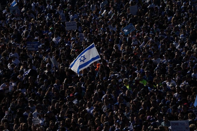 TOPSHOT - Demonstrators in support of Israel gather to denounce antisemitism and call for the release of Israeli hostages, on the National Mall in Washington, DC, on November 14, 2023. Thousands of civilians, both Palestinians and Israelis, have died since October 7, 2023, after Palestinian Hamas militants based in the Gaza Strip entered southern Israel in an unprecedented attack triggering a war declared by Israel on Hamas with retaliatory bombings on Gaza. (Photo by Stefani Reynolds / AFP) (Photo by STEFANI REYNOLDS/AFP via Getty Images)