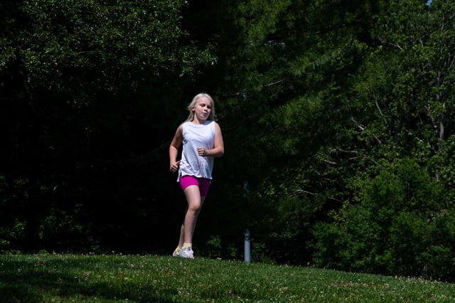 This handout photograph taken on June 26, 2021, and released by The American Civil Liberties Union (ACLU), shows Becky Pepper-Jackson, in Bridgeport, West Virginia. - A transgender child's desire to join her school's female running team could be decided by the US Supreme Court after West Virginia on March 10, 2023 asked the high court to rule on the controversial case. The court was asked to overturn a lower appeals court decision that freezed West Virginia's 2021 law banning Becky Pepper-Jackson and others like her from competing with other girls because she was born a biological male. (Photo by Handout / ACLU / AFP) / RESTRICTED TO EDITORIAL USE - MANDATORY CREDIT "AFP PHOTO / HO / Raymond Thompson Jr /ACLU  " - NO MARKETING NO ADVERTISING CAMPAIGNS - DISTRIBUTED AS A SERVICE TO CLIENTS (Photo by HANDOUT/ACLU/AFP via Getty Images)