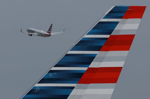 An American Airlines plane takes off from the Miami International Airport on July 20, 2023 in Miami, Florida.
