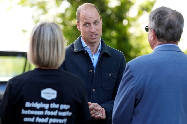 Prince William arrives for a visit to Surplus to Supper, a surplus food redistribution charity in Sunbury-on-Thames in Surrey, outside London on Thursday.
