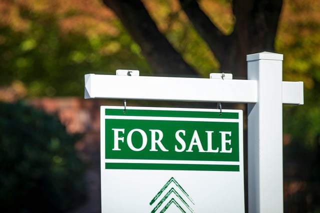 A for sale sign advertises a home in the Harlow Neighborhood in Eugene, Oregon.