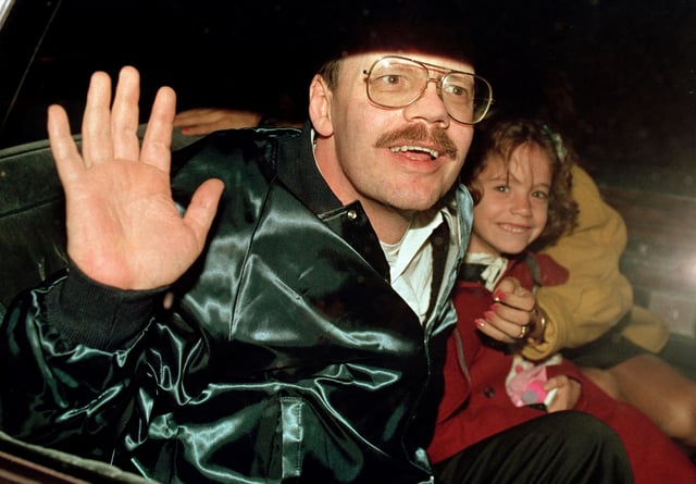 Terry Anderson, who was the longest held American hostage in Lebanon, grins with his 6-year-old daughter Sulome, Dec. 4, 1991, as they leave the U.S. Ambassador's residence in Damascus, Syria, following Anderson's release.