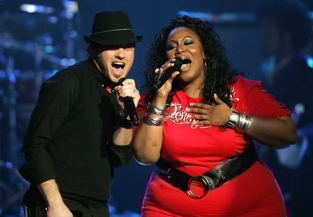 TobyMac, left, and Mandisa entertain the crowd during the 38th annual Dove Awards show at the Grand Ole Opry House on April 25, 2007.