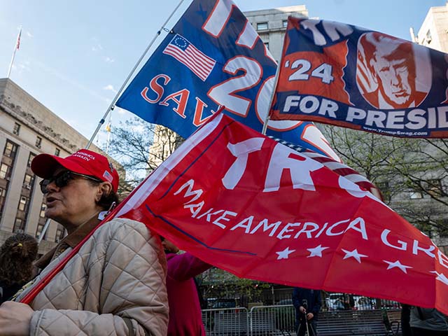 Trump supporters, police and media gather outside of a the Manhattan Criminal Courthouse for the start of first-ever criminal trial against a former president of the United States on April 15, 2024 in New York City. Former President Donald Trump faces 34 felony counts of falsifying business records in the first of his criminal cases to go to trial. (Photo by Spencer Platt/Getty Images)