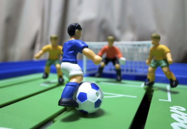 The deal, possibly worth $1 billion, would be another big soccer move for the iPhone giant.
