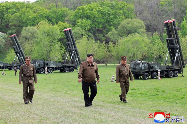 North Korea's leader Kim Jong Un observing a virtual nuclear counterattack training exercise  at an undisclosed location on April 22, 2024.
