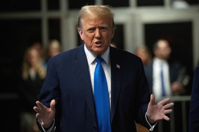 Former U.S. president and Republican presidential candidate Donald Trump speaks to the media after the first day of opening statements in his trial at Manhattan Criminal Court for falsifying documents related to hush money payments, in New York, U.S., April 22, 2024. Victor J. Blue/Pool via REUTERS